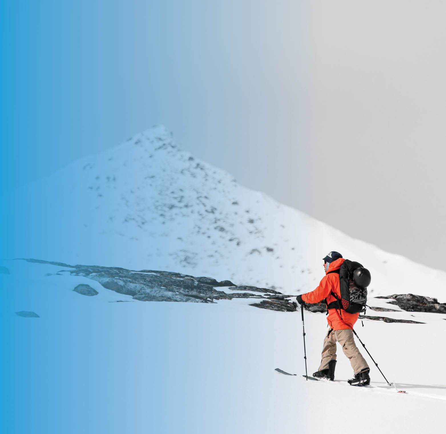 a man in the snowy mountains